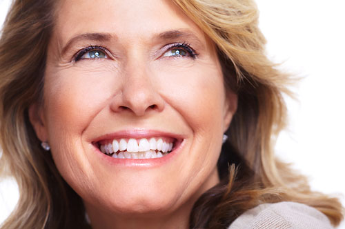 Best Ways to Conceal Smile Flaws: Bonding, Veneers, and Crowns Compared